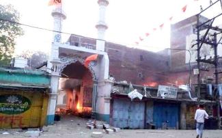 A mosque set on fire by the mob
